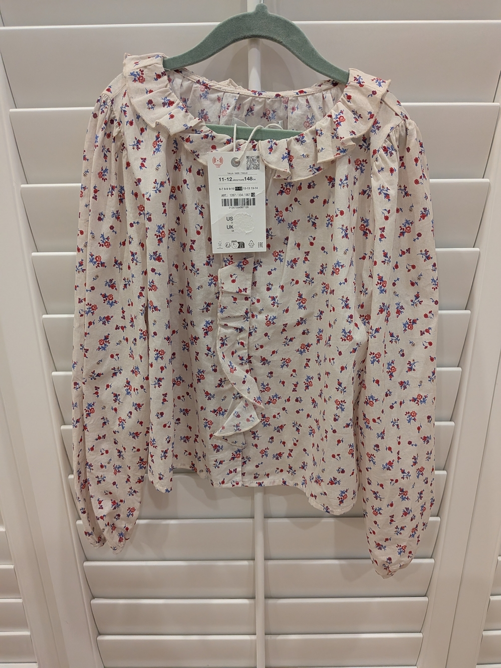 Zara Cream Floral Ruffle Blouse with Red & Blue Accents